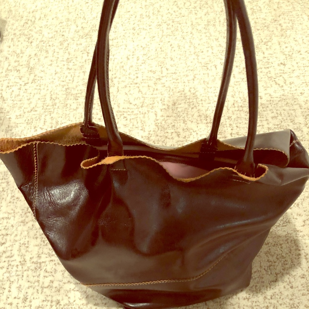 Large brown leather over-the-shoulder bucket bag